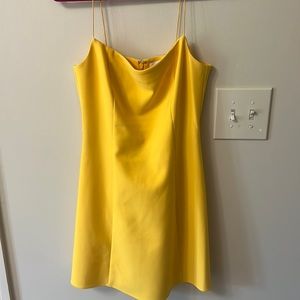 Likely yellow dress
